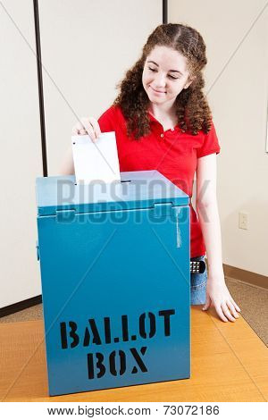 Eighteen year old Latina girl voting for the first time.  