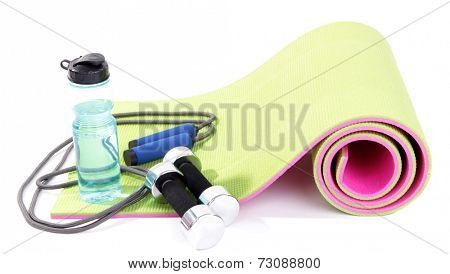 Sports requisites on sport mat isolated on white