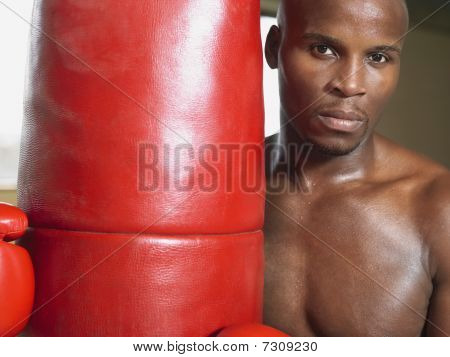 Boxer Holding Boxsack, Portrait, close up