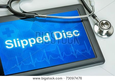 Tablet with the text Slipped disc on the display