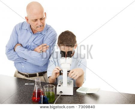 Science Teacher With Student