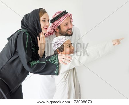 Arabic young family pointing