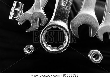 Set of tools on black background