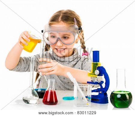 happy little girl with flasks for chemistry isolated on a white background