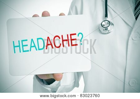 a doctor showing a signboard with the question headache? written in it