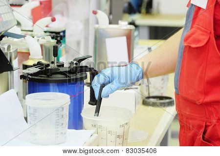 Preparation of paint for car painting in car body shop