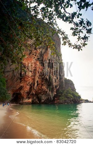 Cliffy Island In Azure Sea Water