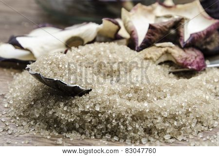 brown cane sugar with silver spoon