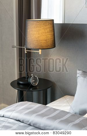 Modern Bedroom With Pillows And Lamp