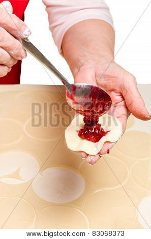Cooking ukrainian varenyky with cherries. Serie.