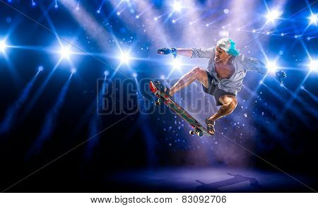The old man is skating on grand arena