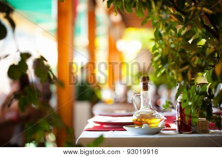 Oil Bottle On A Table At Restaurant