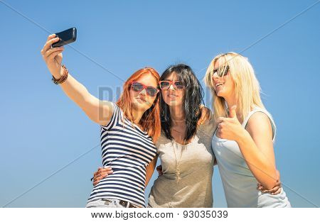 Happy Girlfriends Taking Selfie Against Blue Sky - Friendship Summer Concept With New Trends