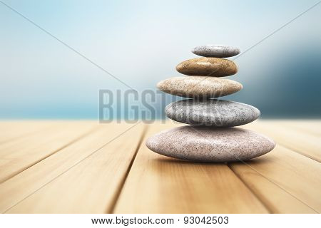 Pile of pebbles on wooden planks