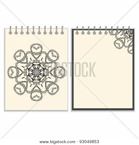 White cover notebook with handmade black pattern