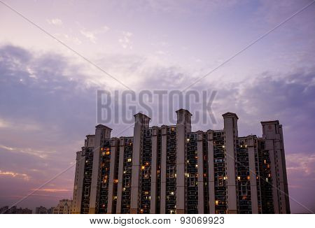 Multistoried Building In Gurgaon With Cloudy Colorful Sky
