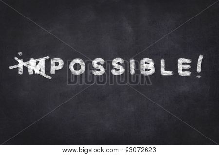 everything is possible - motivation text on chalkboard
