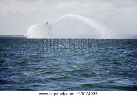 Fireboat In Action On The Sea