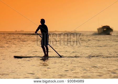 Surfer  At Sunset Tme
