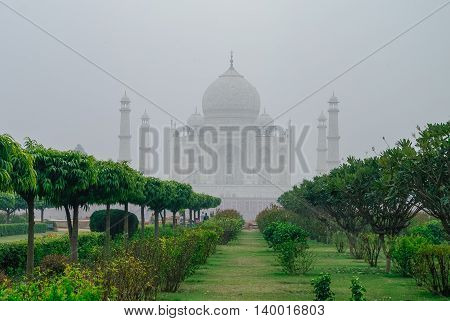 Taj Mahal View In Morning Fog From Across The Mehtab Bagh Or The Moonlight Garden, Agra, India