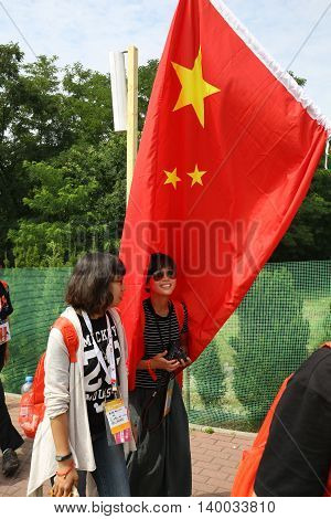 CRACOW POLAND - JULY 26 2016: World Youth Day 2016 - Pilgrims from China in the Sanctuary of Divine Mercy in Lagiewniki. Cracow Poland