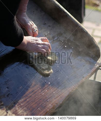 Hands Of The Elderly Woman Washing