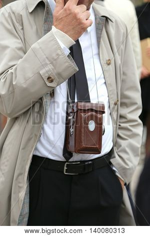 Photojournalist With Antique Camera