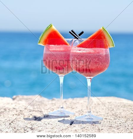 refreshing fruit cockail with watermelon in big glasses for summer parties