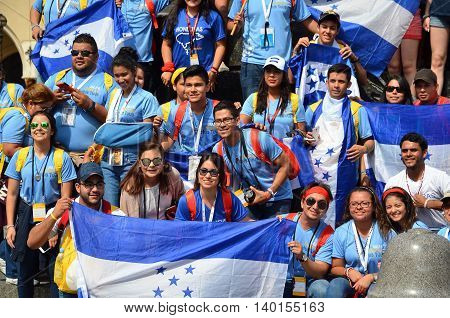 KRAKOW POLAND - JUL 27 2016: World youth day 2016.International Catholic youth Convention. Young people on Main Square in Krakow.