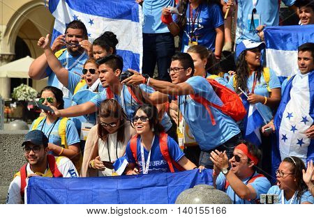 KRAKOW POLAND - JUL 27 2016: World youth day 2016.International Catholic youth Convention. Young people on Main Square in Krakow.