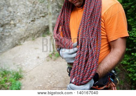 Climber with rope folded in Vadiello, Guara Mountains, Huesca, Aragon, Spain.