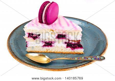 Sweet and Colourful Cake with French Macaroons. Studio Photo