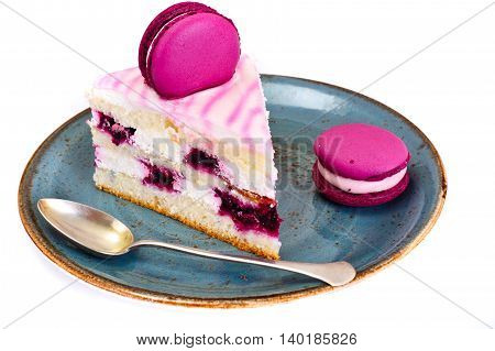 Sweet and Colourful Cake with French Macaroons. Studio Photo