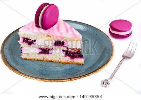 Sweet and Colourful Cake with French Macaroons. Studio Photo
