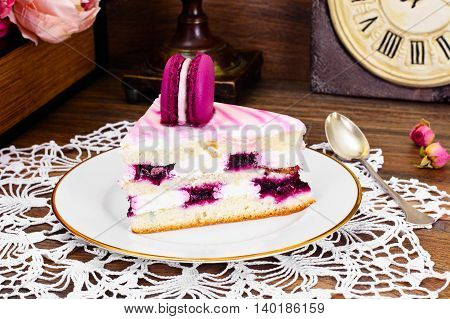 Sweet and Colourful Cake with French Macaroons. Studio Photo