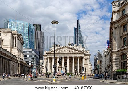 LONDON UK - JULY 1 2014: Royal Exchange with the statue of the Duke of Wellington at the front. It was founded in 16th century to act as a center of commerce for the City of London.
