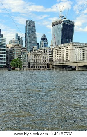 London skyline seen from the Thames river London UK.