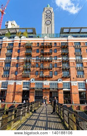 LONDON UK - JULY 1 2014: Oxo Tower building located at south Thames embankment in central London. The building was originally constructed as a power station.