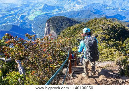 Ranau,Sabah,Borneo-March 13,2016:Group of climbers move down from Low's Peak to Laban Rata check point at Mountain Kinabalu on 13th Mac 2016.There are two summit trails,Ranau Trail & Kota Belud Trail