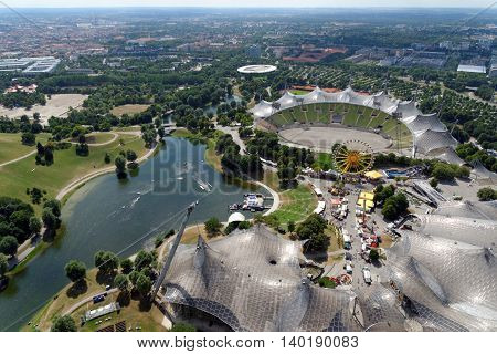 MUNICH GERMANY - AUGUST 4 2015: Aerial view of the Stadium and the Olympic Park constructed for the 1972 Summer Olympics seen from the 291 m high Olympic tower (Olympiaturm).