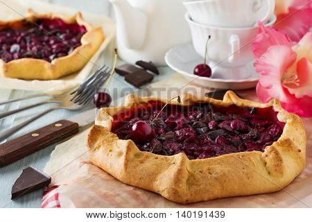 Gallet with cherries and bitter chocolate. Selective focus.