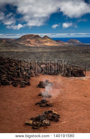 Hot water and steam vents in the Timanfaya National Park ( also called The Montanas del Fuego or Mountains of Fire ) in Lanzarote, Canary Islands, Spain