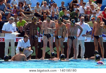 Budapest, Hungary - Jul 14, 2014. German team is listening the strategy in the break. The Waterpolo European Championship was held in Alfred Hajos Swimming Centre in 2014.