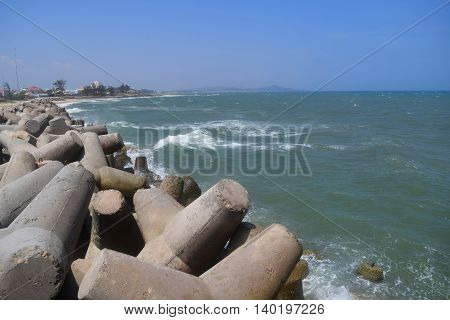 Concrete block tetrapod breakwater protect muine sea vietnam