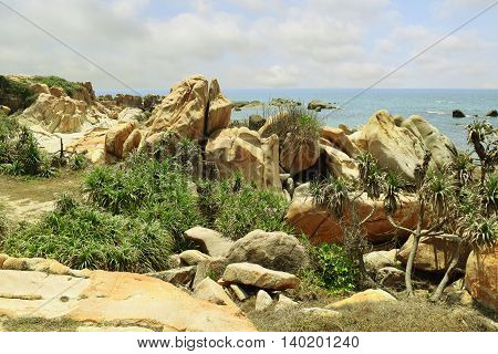 beautiful tropical beach with many rocks on the shore in ke ga near muine vietnam
