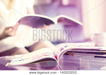 selective focus of the stacking magazine place on table in living room