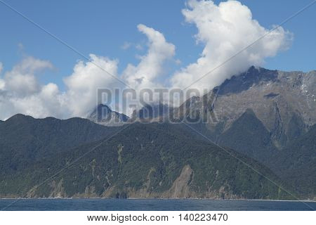 New Zealand Fjordland mountain panorama in sunshine 1