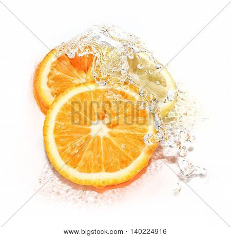 Water splash on lemon and orange slices