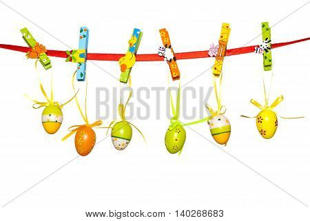 Easter eggs hanging on the rope as a decoration