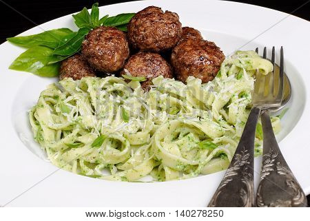 Meatballs with pasta sauce avocado parmesan and basil